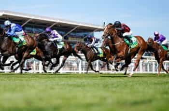 Jim Crowley riding Minzaal to victory at Newbury.